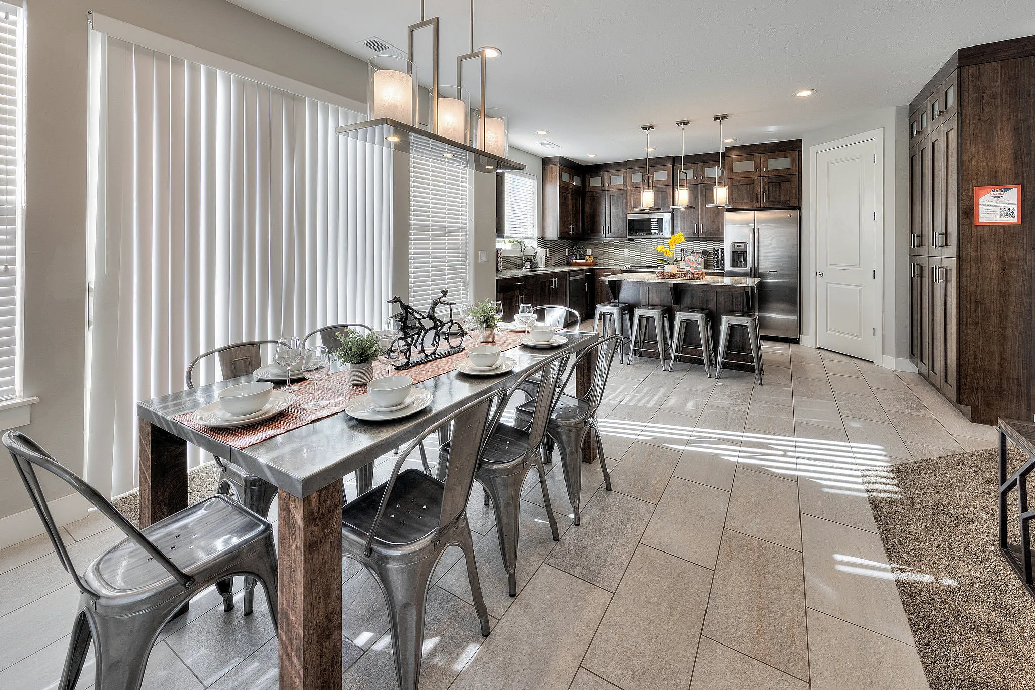 Modern dining area with seating for eight in Entrada 611, located under a mile from downtown Moab.