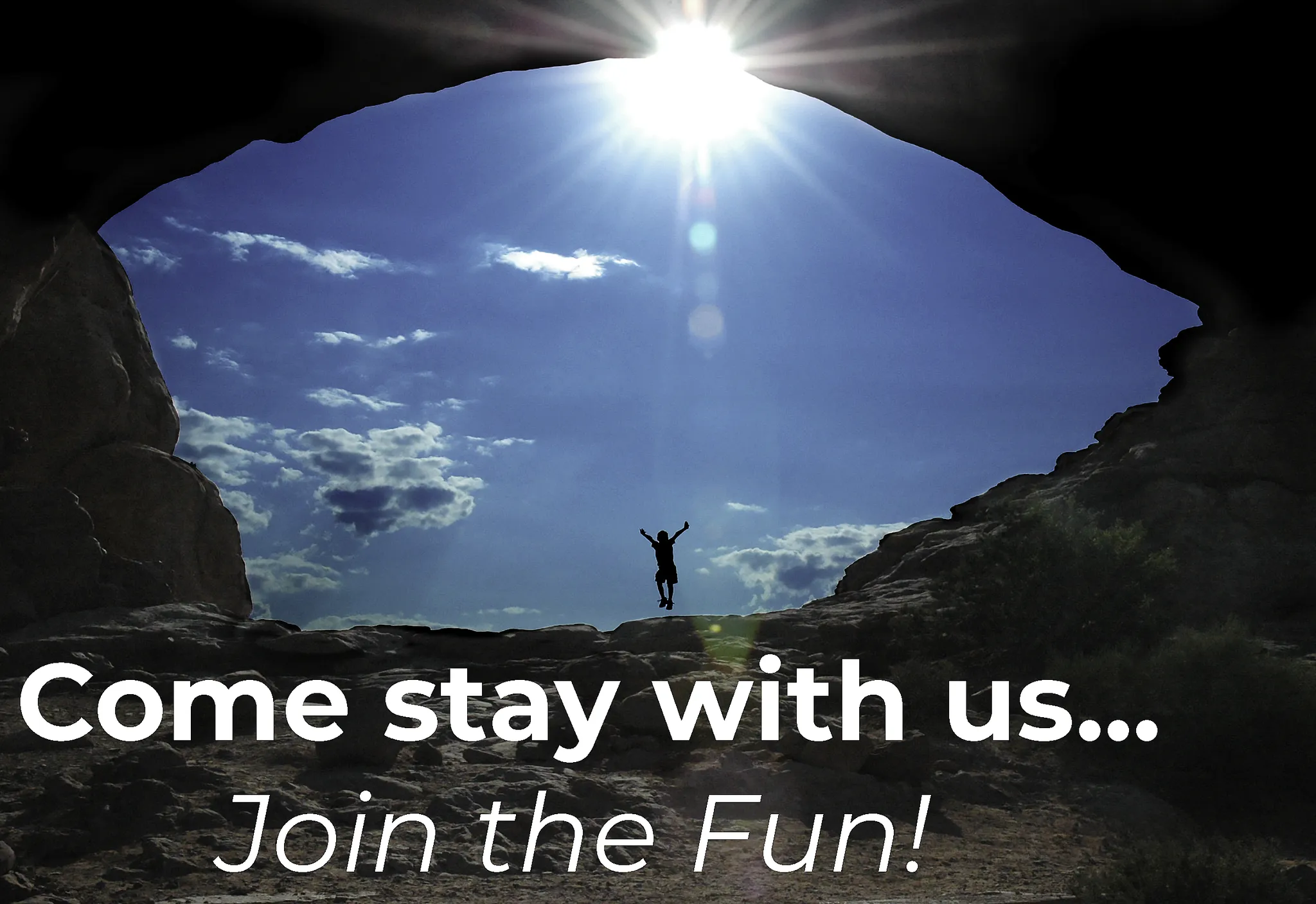 Young boy jumping for joy in Arches National Park in Moab, Utah. 10 minute drive from Entrada