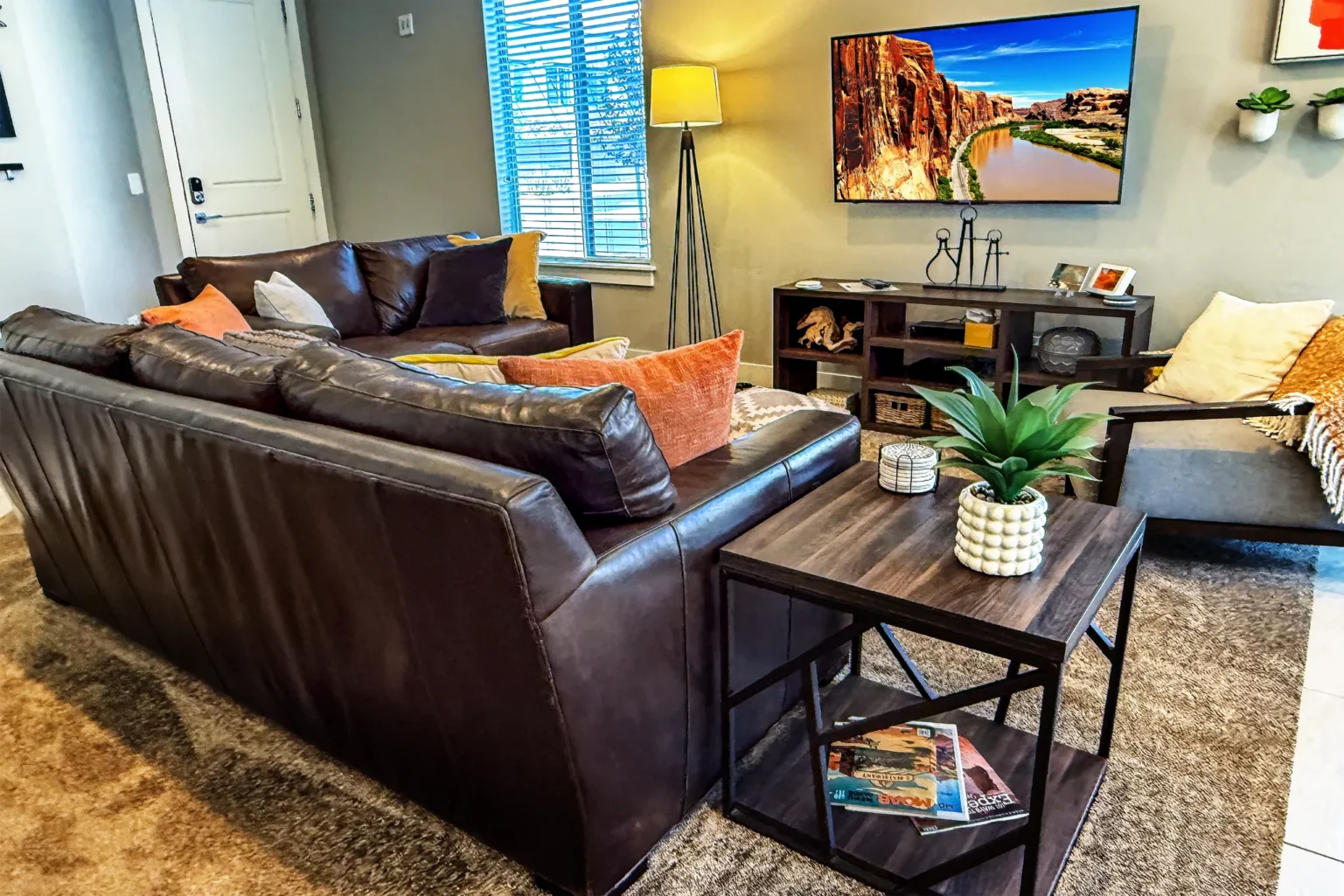 Moab-Entrada-LivingRoom Welcome to Moab Bound at Entrada. These luxury vacation rentals are located less than a mile from downtown Moab and ten minutes from Arches National Park. We offer 3-bedroom and 4-bedroom townhomes (Units 417 and 611) designed as a personal labor of love for families and groups visiting Utah's red rock country.